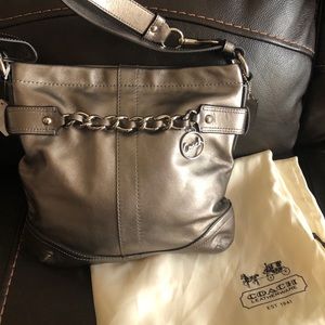 Never Used authentic Coach Bag cross body duffel